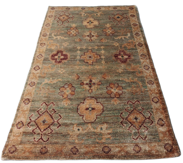 Tanirika Sage Floral Hand-Knotted Jute Rug