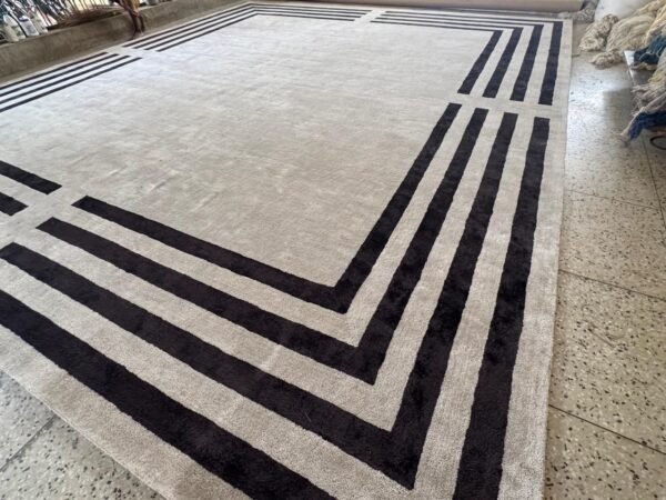 60 (3) Frame Line Hand-Tufted Rug