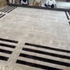 60 (6) Frame Line Hand-Tufted Rug