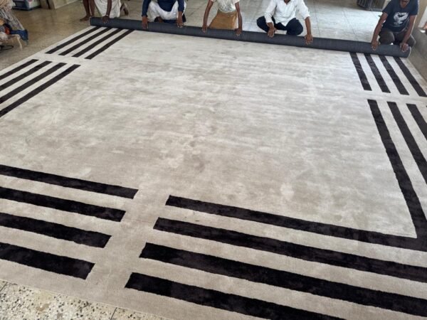 60 (6) Frame Line Hand-Tufted Rug